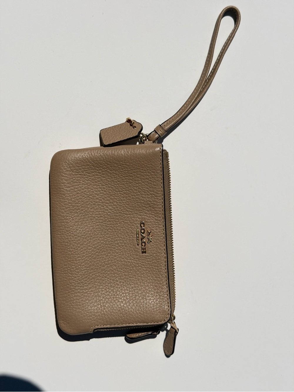Coach Pebbled Leather Wristlet in Taupe